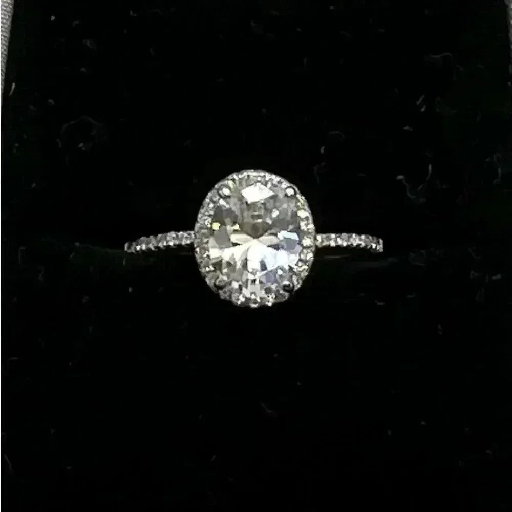 Sterling silver oval halo diamond ring